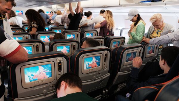 Пассажиры в самолете - Sputnik Южная Осетия