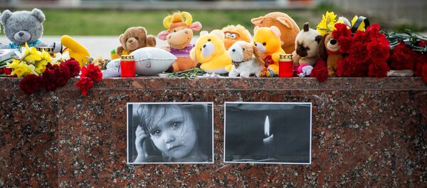 Акции в память о погибших при пожаре в ТЦ Зимняя вишня Акции в память о погибших при пожаре в ТЦ Зимняя вишня - Sputnik Южная Осетия