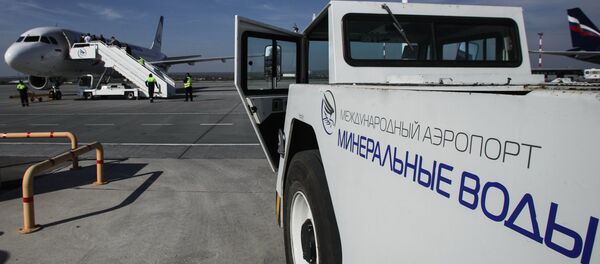 Самолет на стоянке в аэропорту Минеральные воды Самолет на стоянке в аэропорту Минеральные воды - Sputnik Южная Осетия
