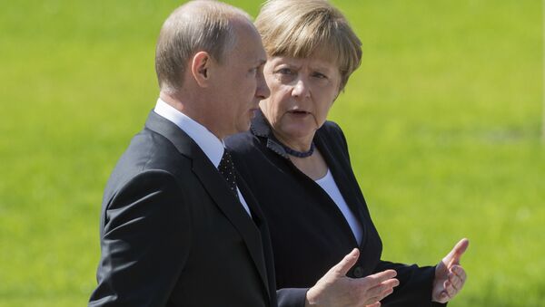 Президент Российской Федерации Владимир Путин и канцлер Федеративной Республики Германия Ангела Меркель. Архивное фото - Sputnik Южная Осетия