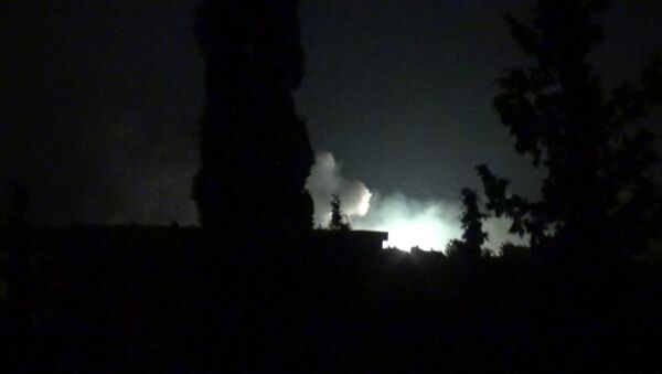 Пожар и взрывы в Сирии: последствия атаки на военную базу возле Хамы - Sputnik Южная Осетия