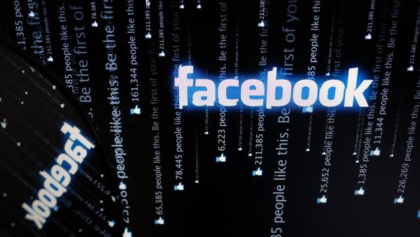 Логотип социальной сети Фейсбук на экране компьютера. - Sputnik Южная Осетия