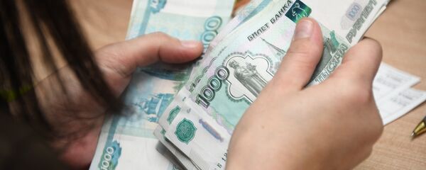 Пересчет денег  Пересчет денег  - Sputnik Южная Осетия