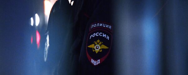 Нашивка на рукаве сотрудника полиции в России, архивное фото Нашивка на рукаве сотрудника полиции в России, архивное фото - Sputnik Южная Осетия