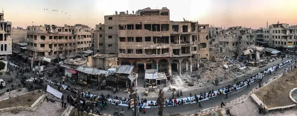 Работа фотографа Mohammed Badra Iftar Amongst the Ruins, занявшая первое место в номинации Новости фотоконкурса 2018 iPhone Photography Awards Работа фотографа Mohammed Badra Iftar Amongst the Ruins, занявшая первое место в номинации Новости фотоконкурса 2018 iPhone Photography Awards - Sputnik Южная Осетия
