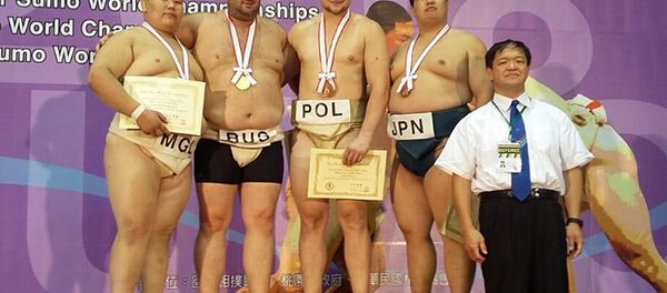 Василий Маргиев и Эдуард Кудзоев – чемпионы мира по сумо Василий Маргиев и Эдуард Кудзоев – чемпионы мира по сумо - Sputnik Хуссар Ирыстон