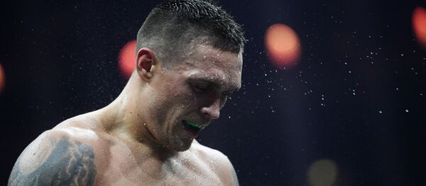 Александр Усик в финальном бое WBSS против Мурата Гассиева Александр Усик в финальном бое WBSS против Мурата Гассиева - Sputnik Южная Осетия