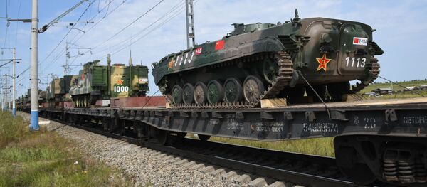 Эшелоны с военнослужащими и военной техникой армии Китая, которые примут участие в военных учениях Восток-2018 Эшелоны с военнослужащими и военной техникой армии Китая, которые примут участие в военных учениях Восток-2018 - Sputnik Южная Осетия