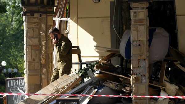 Ситуация на месте взрыва в донецком кафе Сепар - Sputnik Южная Осетия