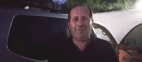 Аслан Сангулия Аслан Сангулия - Sputnik Южная Осетия