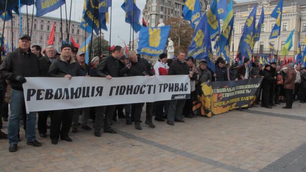 СПУТНИК_Националисты с портретами Бандеры прошли по Киеву в годовщину создания УПА - Sputnik Южная Осетия