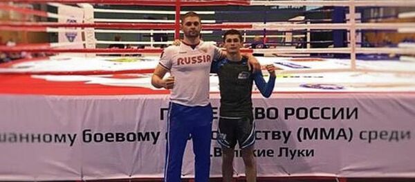 Давид Цугкиев – серебряный призер юношеского первенства России по СБЕ ММА Давид Цугкиев – серебряный призер юношеского первенства России по СБЕ ММА - Sputnik Южная Осетия