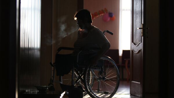 Женщина в инвалидной коляске, фото из архива - Sputnik Южная Осетия