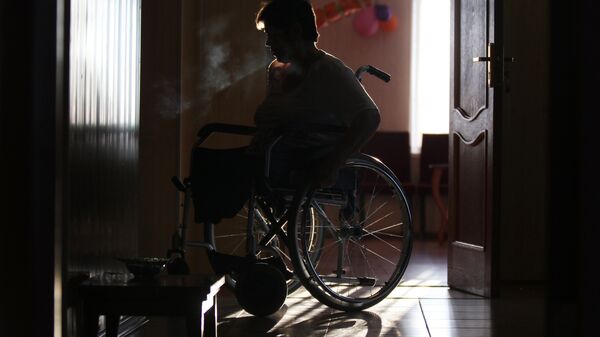 Женщина в инвалидной коляске, фото из архива - Sputnik Южная Осетия