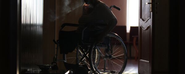 Женщина в инвалидной коляске, фото из архива - Sputnik Южная Осетия