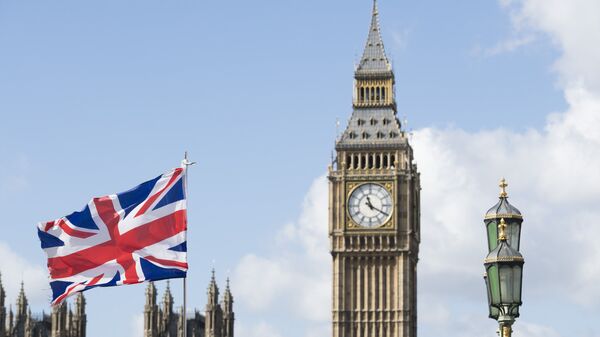 Флаг Великобритании на фоне Вестминстерского дворца в Лондоне. - Sputnik Южная Осетия