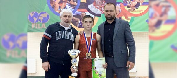 Победитель юношеского турнира по греко-римской борьбе Давид Теблоев Победитель юношеского турнира по греко-римской борьбе Давид Теблоев - Sputnik Южная Осетия