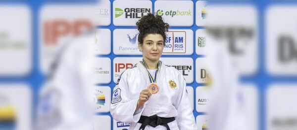 Мадина Таймазова завоевала бронзовую награду в категории 70 кг Мадина Таймазова завоевала бронзовую награду в категории 70 кг - Sputnik Южная Осетия