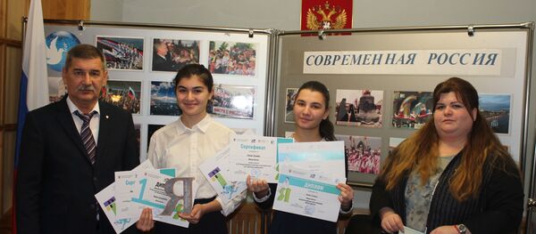 Россотрудничествойы хистӕр Хуссар Иры раарфӕ кодта Мӕскуыйы олимпиадӕйы уӕлахиздзаутӕн Россотрудничествойы хистӕр Хуссар Иры раарфӕ кодта Мӕскуыйы олимпиадӕйы уӕлахиздзаутӕн - Sputnik Хуссар Ирыстон