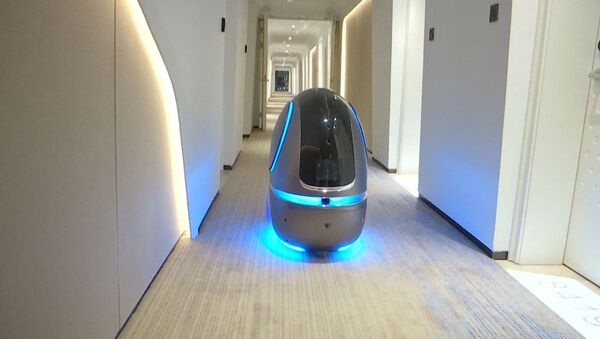Отель будущего с роботами появился в Китае - Sputnik Южная Осетия