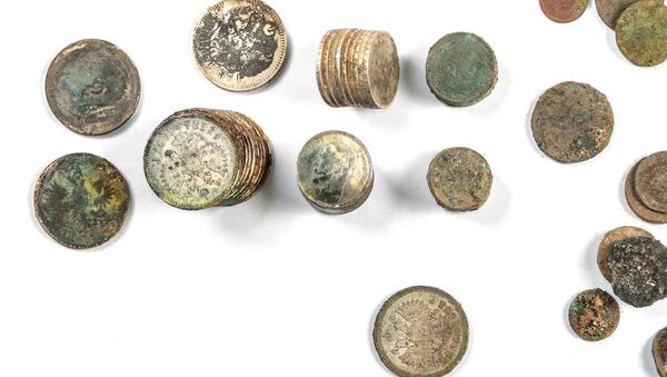 Клад серебряных и медных монет нашли в Москве - Sputnik Южная Осетия