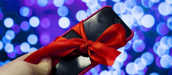 Телефон в подарок - Sputnik Южная Осетия