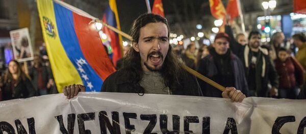 Акция в Мадриде в поддержку Н. Мадуро - Sputnik Южная Осетия