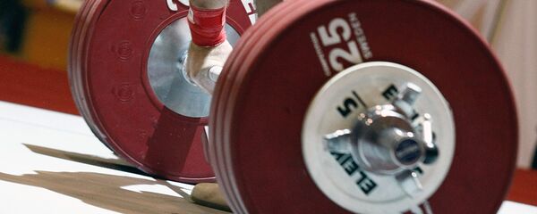 Спортсмен на соревнованиях по тяжелой атлетике - Sputnik Южная Осетия