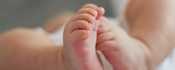 Новорожденный. Архивное фото Новорожденный. Архивное фото - Sputnik Южная Осетия