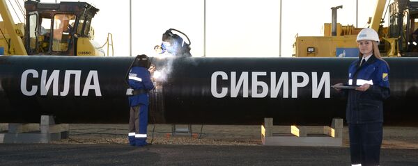 Сварка шва на церемонии соединения первого звена магистрального газопровода Сила Сибири Сварка шва на церемонии соединения первого звена магистрального газопровода Сила Сибири - Sputnik Южная Осетия