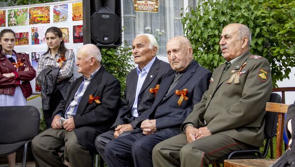 Мероприятие в центральной библиотеке ко Дню Победы - Sputnik Южная Осетия