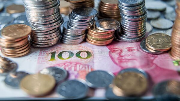 Монеты и банкноты китайских юаней  - Sputnik Южная Осетия