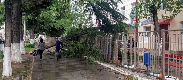 Последствия дождя и града в Цхинвале Последствия дождя и града в Цхинвале - Sputnik Южная Осетия