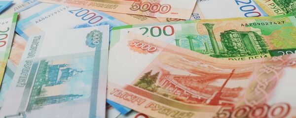 Российские банкноты  Российские банкноты  - Sputnik Южная Осетия