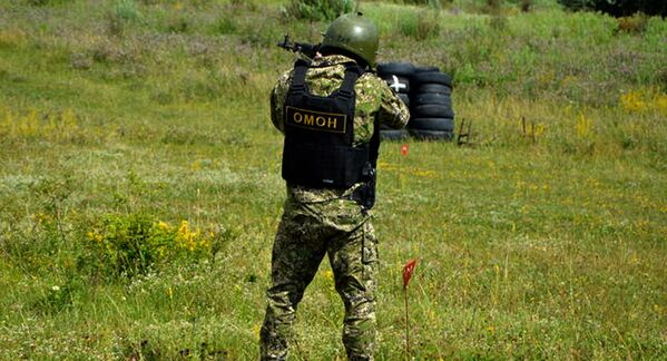 Боец ОМОН Южной Осетии на учениях Боец ОМОН Южной Осетии на учениях - Sputnik Южная Осетия