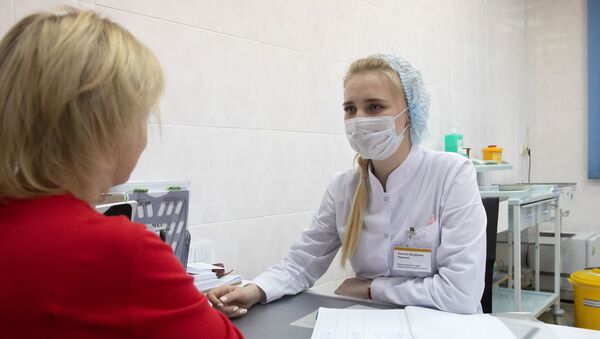  Пациентка в прививочном кабинете в городской поликлинике - Sputnik Южная Осетия