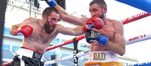 Бой боксер Асланбека Козаева с Крисом Ван Хеерденом - Sputnik Южная Осетия