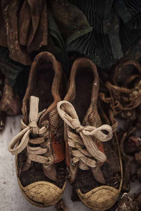Перу, 2014 год, Эти туфли были на Ольге в день убийства. Личные вещи были переданы семье вместе с идентифицированными останками - Sputnik Южная Осетия