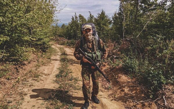 Сотрудник Погранслужбы КГБ Южной Осетии на посту у села Цнелис - Sputnik Южная Осетия