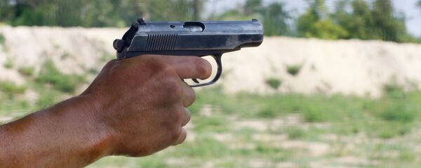 Пистолет Макарова в руке стрелка - Sputnik Южная Осетия