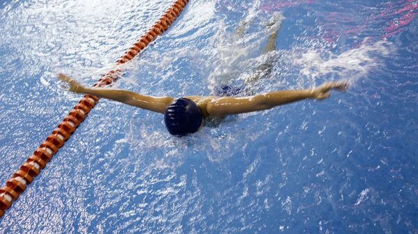 Пловец в бассейне. Архивное фото - Sputnik Южная Осетия
