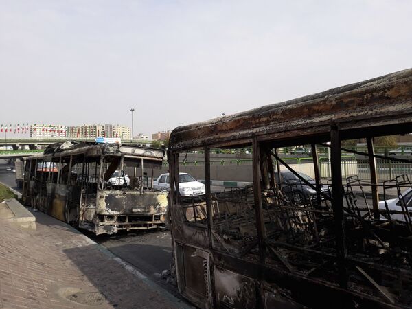 Сожженные автобусы в Тегеране  - Sputnik Южная Осетия