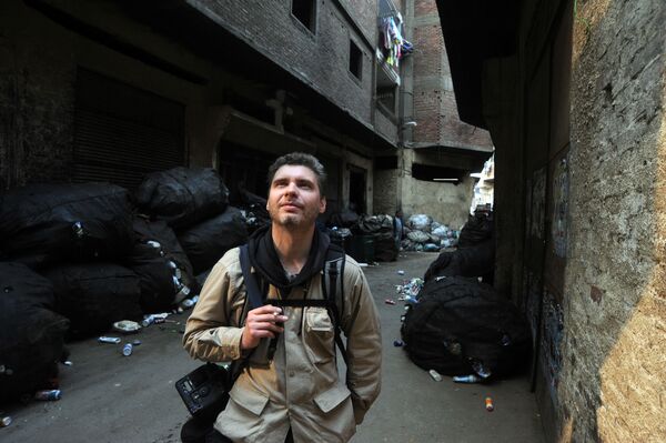 Фотокорреспондент Андрей Стенин на улице Каира - Sputnik Южная Осетия