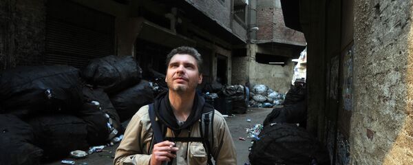 Фотокорреспондент Андрей Стенин на улице Каира - Sputnik Южная Осетия