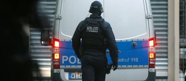 Сотрудник полиции в Германии Сотрудник полиции в Германии - Sputnik Южная Осетия